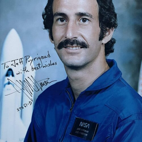 Two autographed portraits of Jeffrey Hoffman, American astronaut on the Discovery mission, one of which is with his team