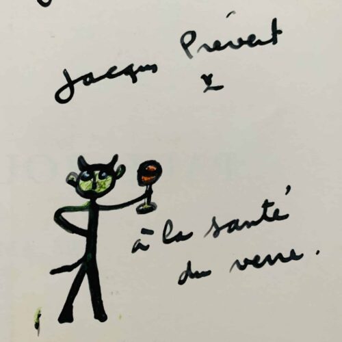 Jacques Prévert signiert ein Ausstellungsheft mit einer lustigen kleinen Zeichnung