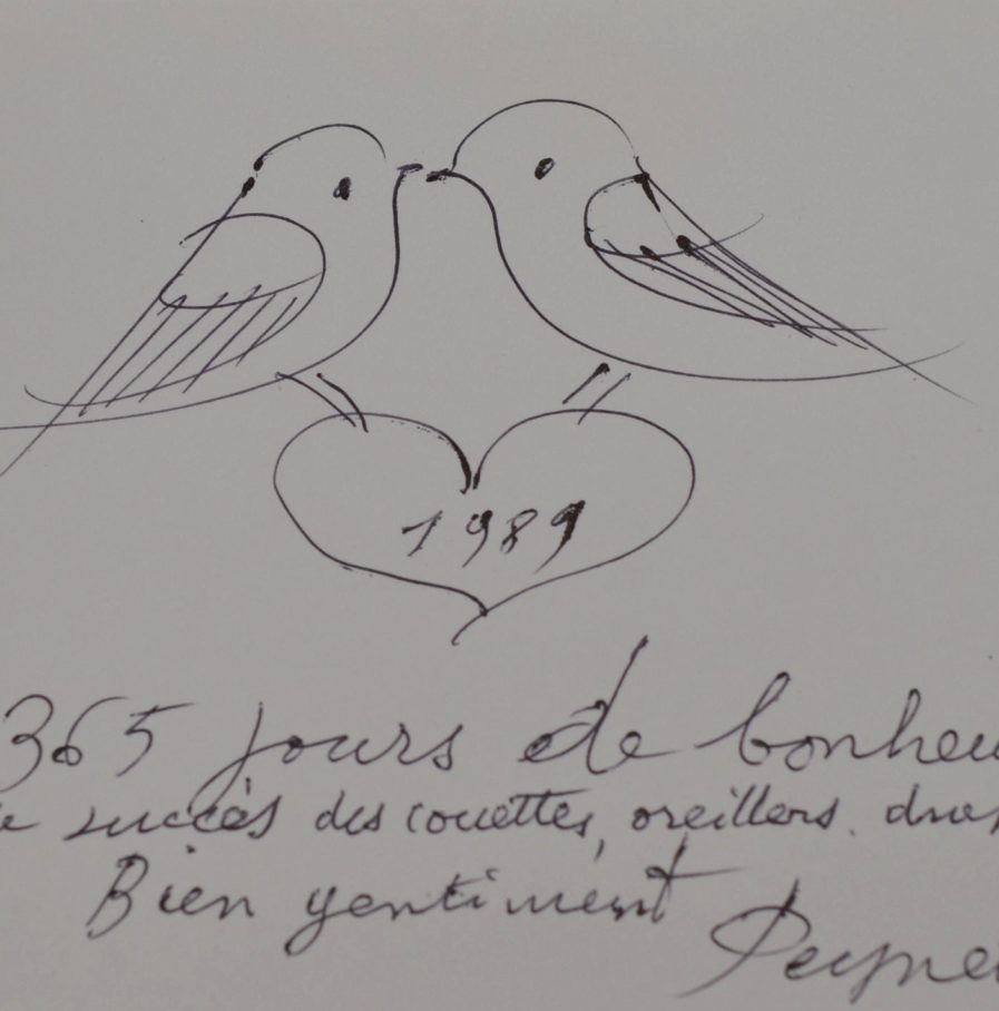 Un couple de tourtereaux dessiné par Peynet.